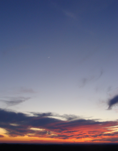 Sunset highlights crescent moon and Venus